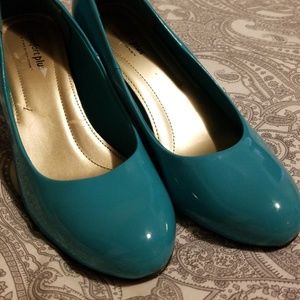 Teal high heel shoes